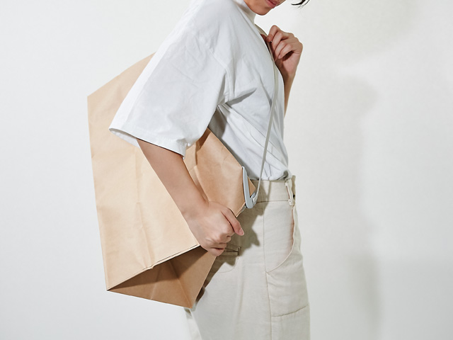 A paper bag is turned into a fashion item